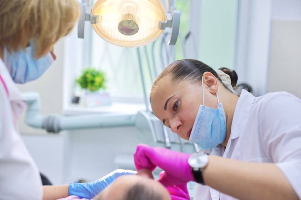 sedation dentist in Blackwell giving IV sedation to patient